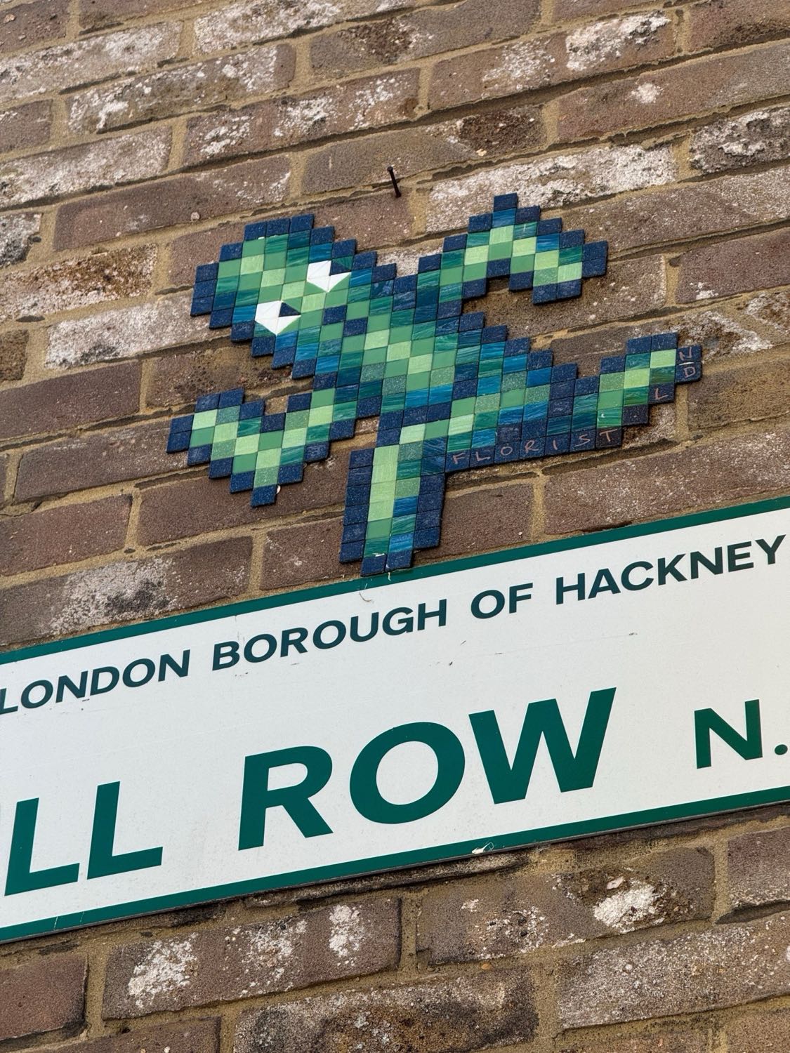 Mill Row / Junction of Kingsland Roar N1 mosaic artwork in London