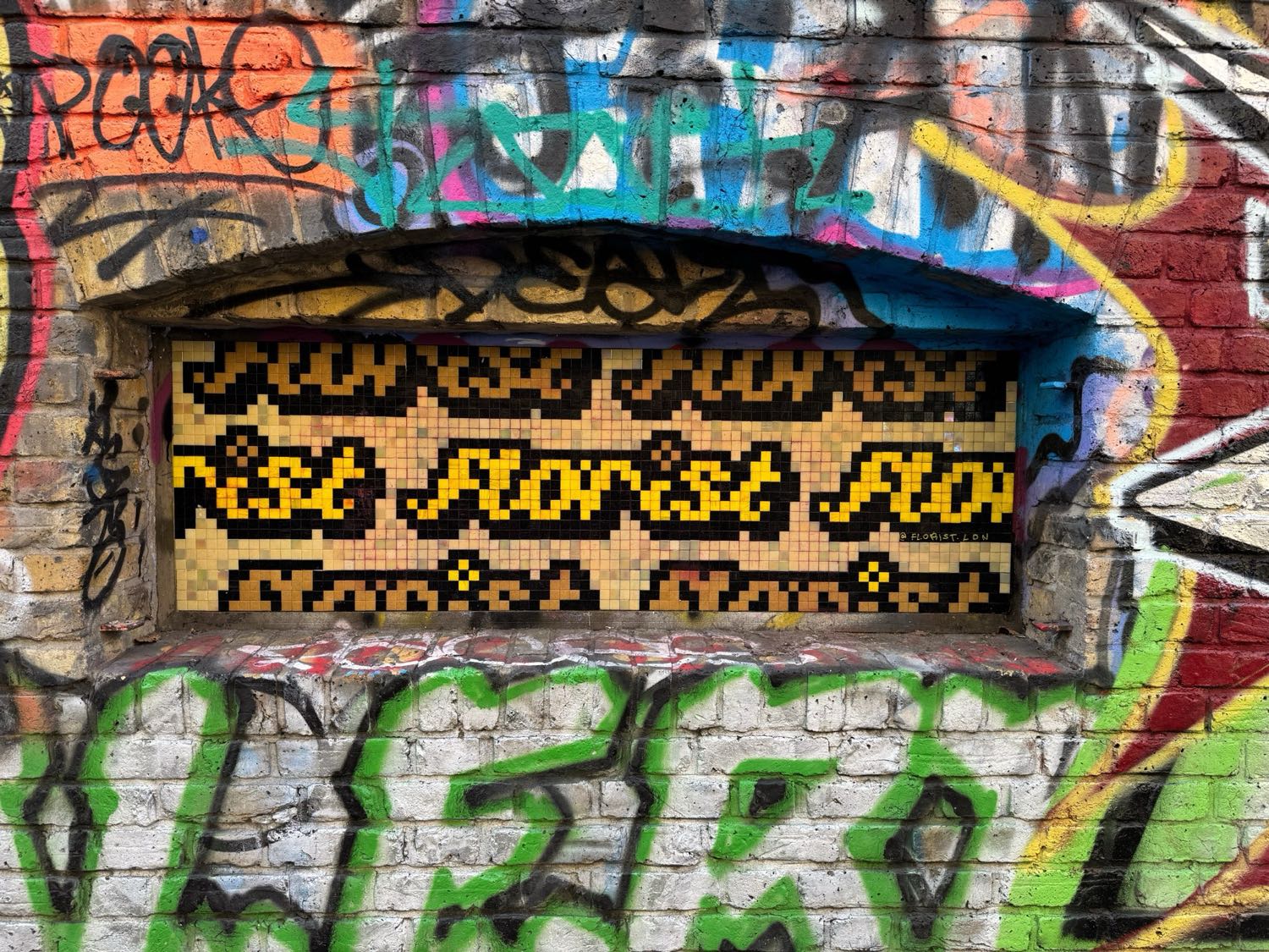 Quaker Street / Junction of Brick Lane mosaic artwork in London