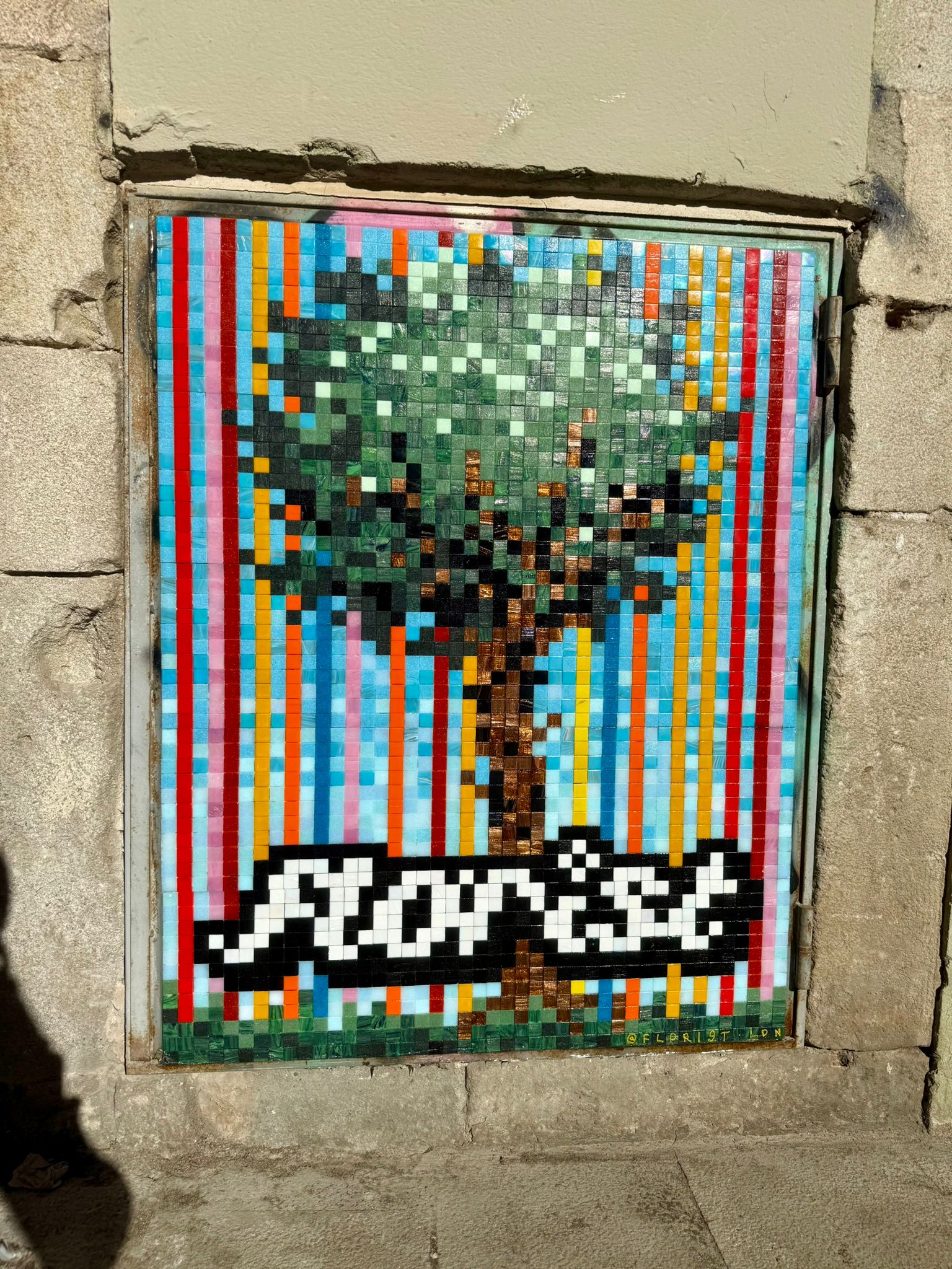 PlaΓ§a del Pine tree mosaic artwork in Barcelona